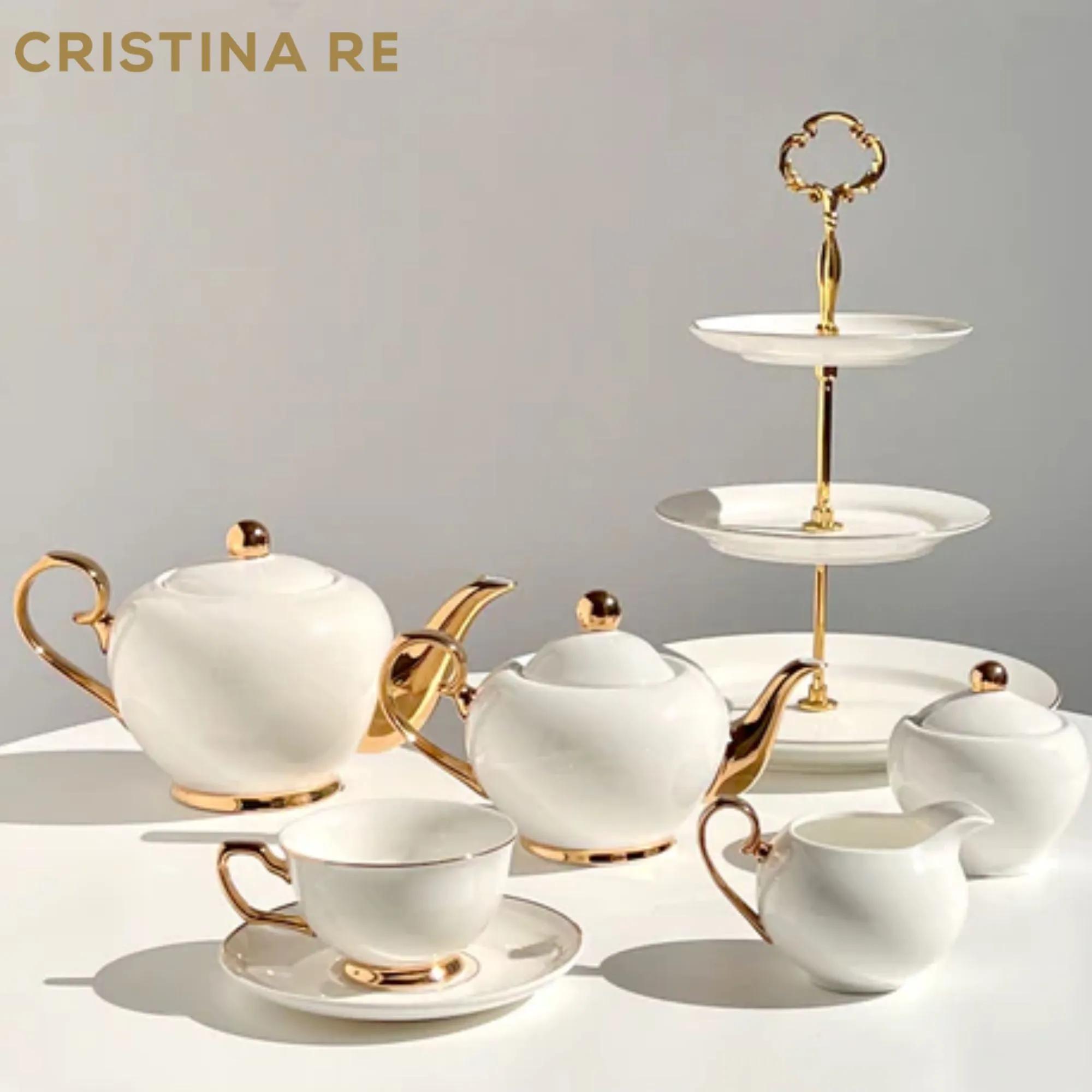 Elegant high tea table with luxury teaware.